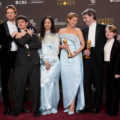 Joe Alwyn, from left, Noah Jupe, Chloe Zhao, Jessie Buckley, Paul Mescal, and Jacobi Jupe pose in the press room with the award for best motion picture - drama for "Hamnet" during the 83rd Golden Globes on Sunday, Jan. 11, 2026, at the Beverly Hilton in Beverly Hills, Calif. (AP Photo/Chris Pizzello)