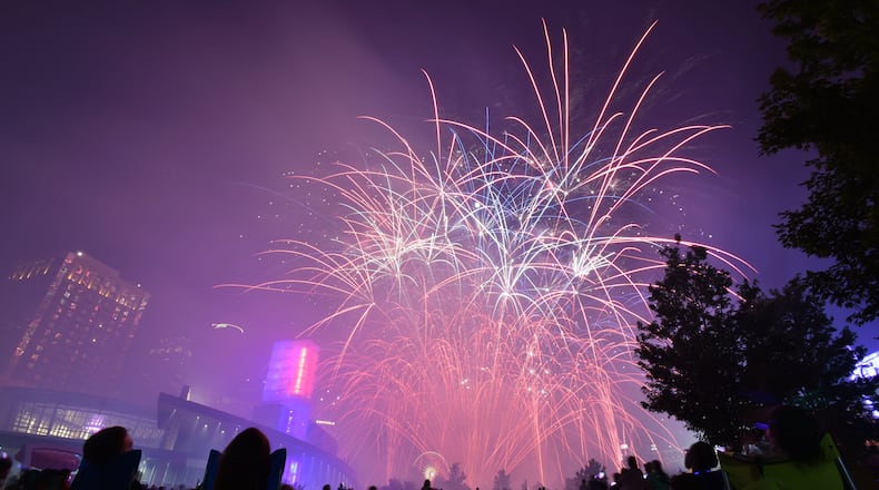 Fireworks light up downtown Atlanta's skyline during July 4th celebration last year at Centennial Olympic Park. HYOSUB SHIN / HSHIN@AJC.COM