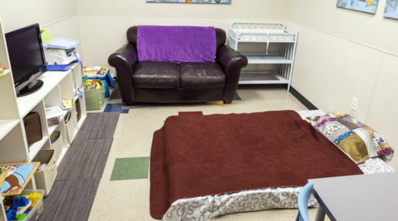 A visitation room is set up wit a bed as a possible solution to the growing number of foster children and pacing the available foster parents needed at a child protective services office in Austin, Texas, on Thursday, March 24, 2016.