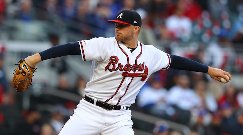 Braves pitcher Sean Newcomb delivers a pitch against the Chicago Cubs. Curtis Compton/ccompton@ajc.com