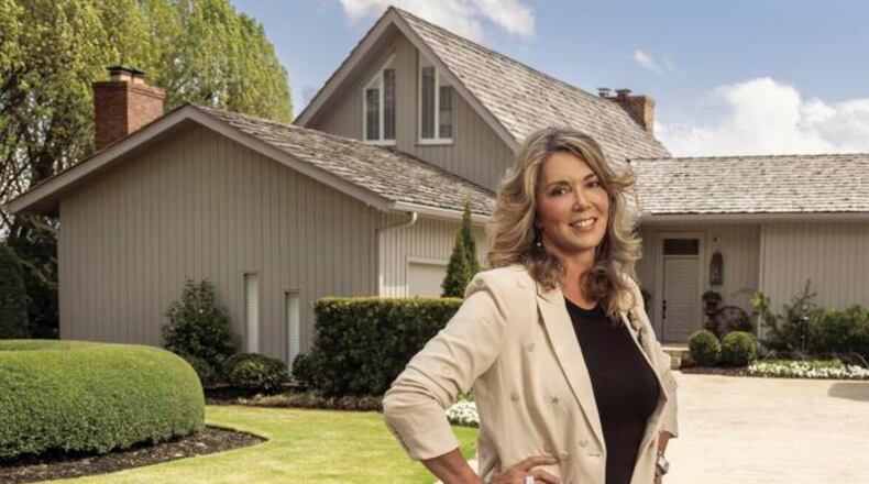 Cobb County real estate agent Glennda Baker, owner of Glennda Baker and Associates, outside her home, a California Contemporary, in Atlanta Country Club. (HADLEY(s) Photography)