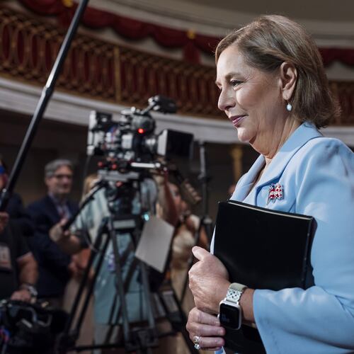 Newly-sworn Sen. Darline Graham, R-S.C., sister of Lindsey Graham, walks past cameras as she leaves the Old Senate Chamber following a cermonial oath of office ceremony allowing her to serve as her late brother's temporary replacement, at the Capitol in Washington, Tuesday, July 14, 2026, (AP Photo/J. Scott Applewhite)