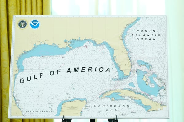 A map with Gulf of America written on it is pictured during a swearing in ceremony for Dr. Mehmet Oz to be Administrator of the Centers for Medicare and Medicaid Services, in the Oval Office of the White House, Friday, April 18, 2025, in Washington. (AP Photo/Alex Brandon)