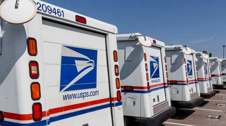 Tavion Lashawn Williams, 21, and Justin Andrew Sams, 34, were indicted on multiple federal charges after both were accused of robbing postal workers at gunpoint, according to the U.S. Attorney's Office for the Northern District of Georgia.