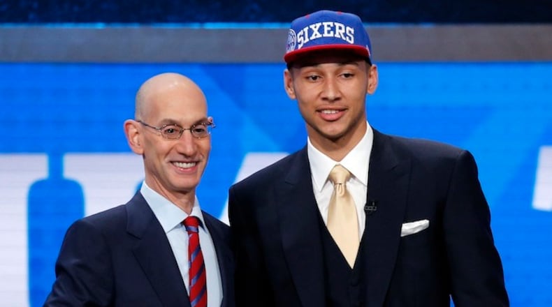 Ben Simmons, the Philadelphia 76ers' first-round, and first overall, draft pick with NBA Commissioner Adam Silver, left, during the NBA Draft on Thursday, June 23, 2016, from Barclays Center in Brooklyn, N.Y. (Yong Kim/Philadelphia Daily News/TNS)