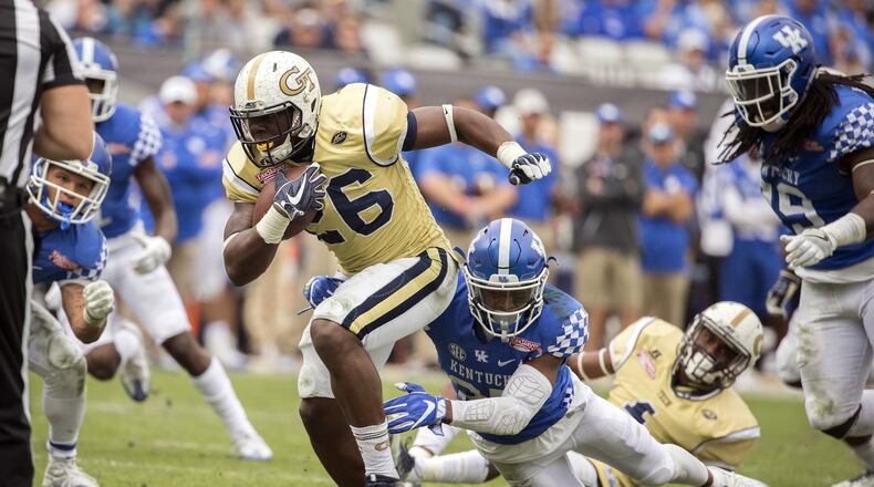 Dedrick Mills runs for yardage during Georgia Tech’s victory in the TaxSlayer Bowl in December. Mills has been kicked off the team for a violation of athletic department rules, the school announced Friday. STEPHEN B. MORTON/ASSOCIATED PRESS
