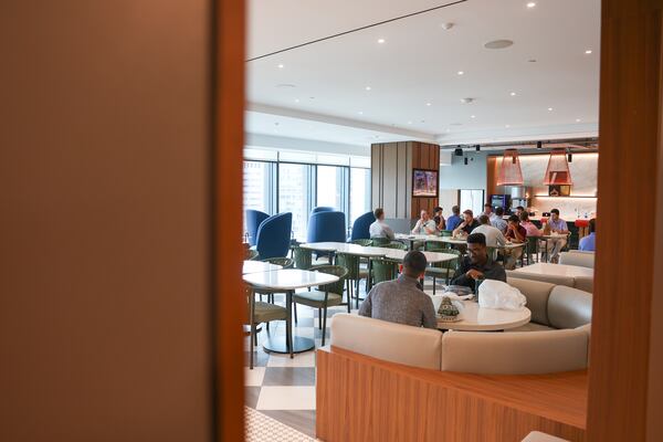 People dine at EY’s new offices at Ten Twenty Spring in Atlanta on Aug. 26, 2026. (Arvin Temkar/AJC)