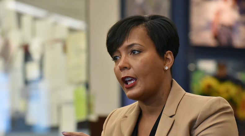 Atlanta Mayor Keisha Lance Bottoms is heading the drafting committee for this year's national Democratic Party platform, which now includes assurances that the party would oppose "power grabs" such as a state takeover of Hartsfield-Jackson International Airport. HYOSUB SHIN / HSHIN@AJC.COM