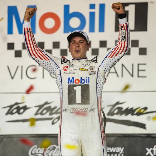 Christopher Bell celebrates in Victory Lane after winning a NASCAR Cup Series auto race Sunday, Sept. 6, 2026, in Darlington, S.C. (AP Photo/Matt Kelley)