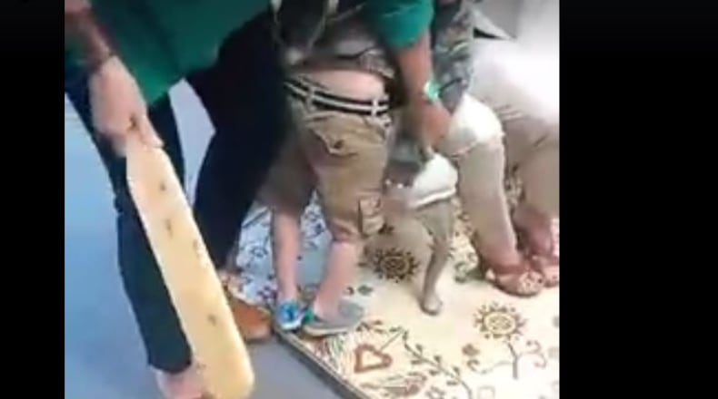 This screen grab came from a video of two Jasper County educators paddling a 5-year-old. Posted online by the child's mother, the video created a national furor and has now been viewed by nearly 6 million people.