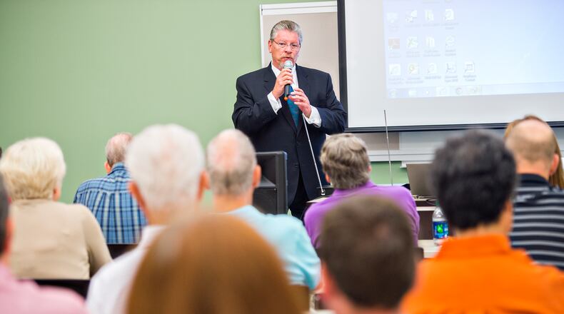Fulton County's chief appraiser, David Fitzgibbon, speaks at a town hall meeting in Alpharetta, June 30. (Jonathan Phillips / Special)
