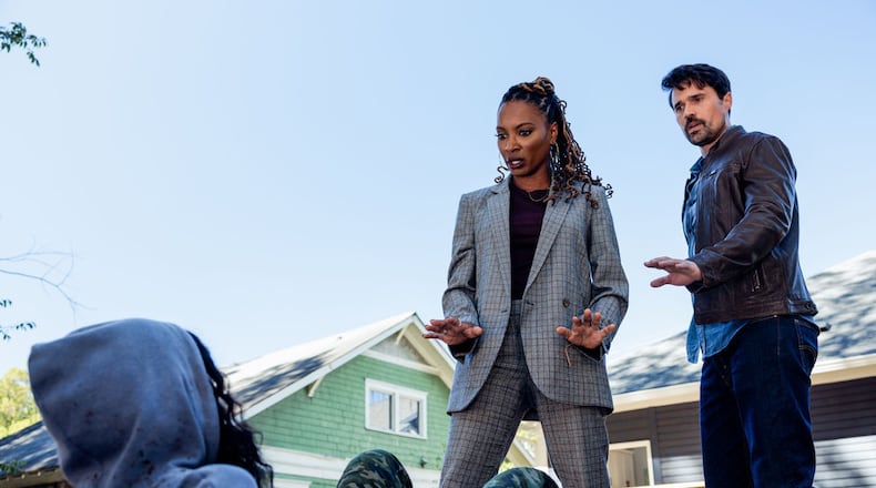 FOUND -- "Missing While Sinning" Episode 102 -- Pictured: (l-r) Shanola Hampton as Gabi Mosely, Brett Dalton as Detective Mark Trent -- (Photo by: Steve Swisher/NBC)