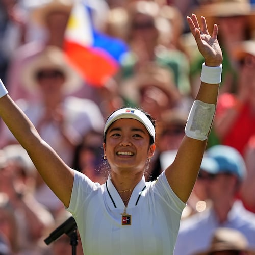 Alexandra Eala of the Philippines celebrates winning the third round women's singles match against Iga Swiatek of Poland at the Wimbledon Tennis Championships in London, Saturday, July 4, 2026.(AP Photo/Maja Smiejkowska)