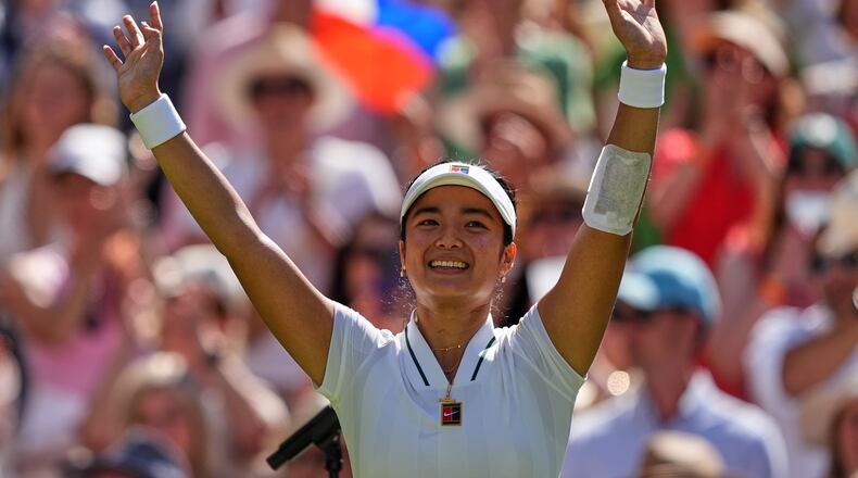 Alexandra Eala of the Philippines celebrates winning the third round women's singles match against Iga Swiatek of Poland at the Wimbledon Tennis Championships in London, Saturday, July 4, 2026.(AP Photo/Maja Smiejkowska)