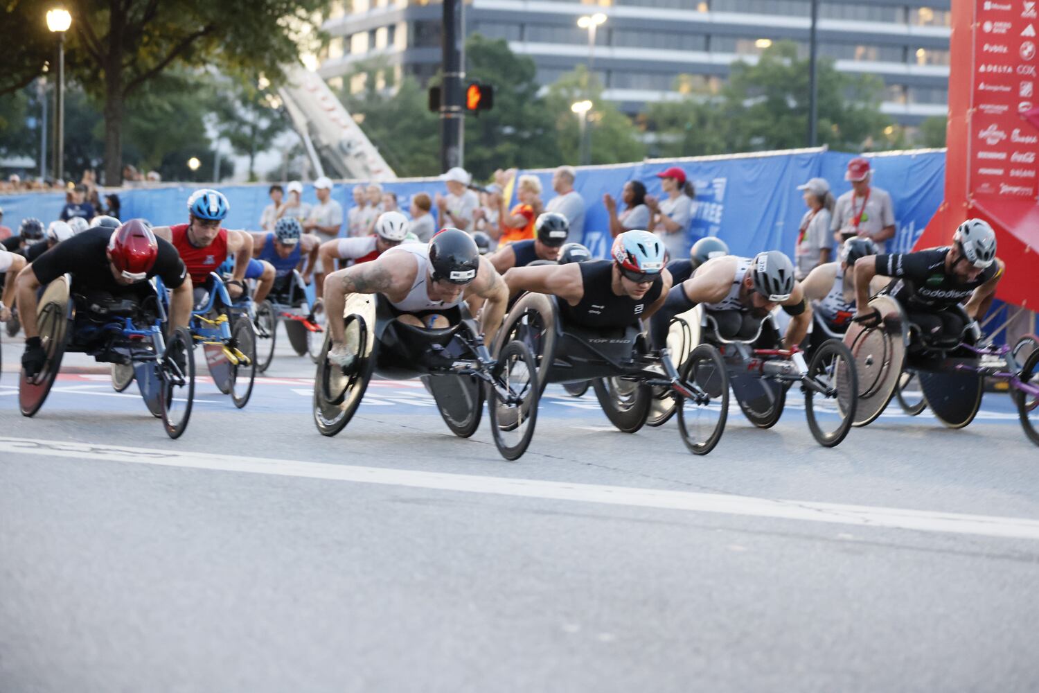 Men’s wheelchair division at the start of the 55th running of the Atlanta Journal-Constitution Peachtree Road Race in Atlanta on Thursday, July 4, 2024.   (Miguel Martinez / AJC)