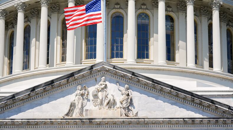The U.S. flag flies at half-staff at the Capitol in Washington, Monday, July 13, 2026, after the sudden death of prominent Republican Senator Lindsey Graham of South Carolina. (AP Photo/Mariam Zuhaib)
