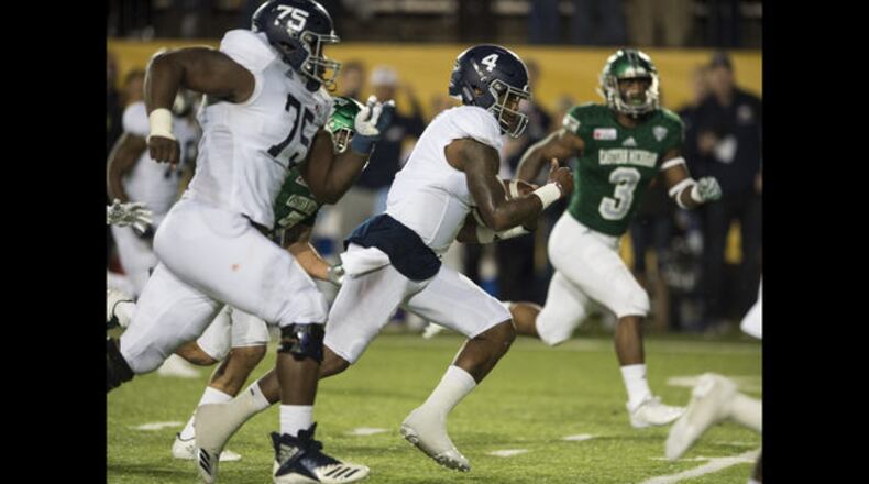 Georgia Southern quarterback Shai Werts (4) runs into the end zone for a touchdown during the Camellia Bowl NCAA college football game in Montgomery, Ala., on Saturday, Dec. 15, 2018.