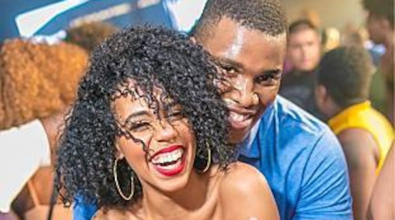 Party goers take a moment for a picture at a previous IAMAfricaan event.