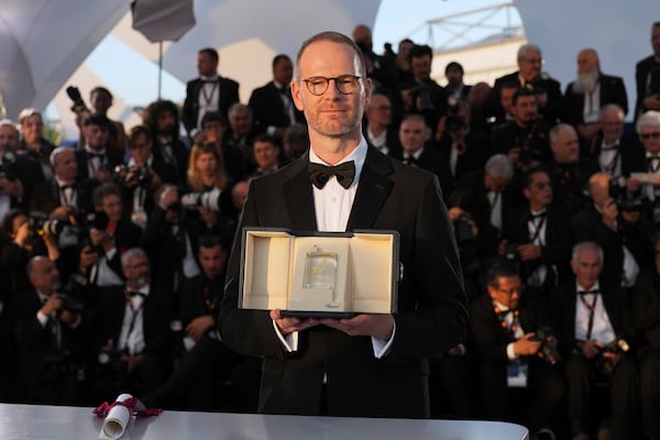 Director Joachim Trier, winner of the grand prix for the film 'Sentimental Value', poses for photographers at the awards ceremony photo call at the 78th international film festival, Cannes, southern France, Saturday, May 24, 2025. (AP Photo/Natacha Pisarenko)