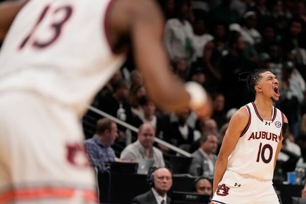 Auburn guard Chad Baker-Mazara (10) reacts to a basket against Michigan State during the second half in the Elite Eight of the NCAA college basketball tournament, Sunday, March 30, 2025, in Atlanta. (AP Photo/Brynn Anderson)