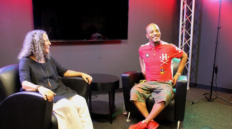 Gina Belafonte and T.I. share a laugh while in Atlanta last month. Photo: Melissa Ruggieri/AJC