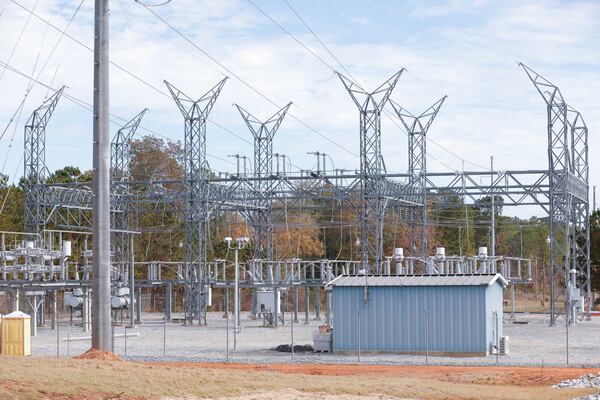 High-voltage transmission lines are shown near a Georgia Power battery energy storage system near Columbus, Ga. on Tuesday, Nov. 14, 2023. (Natrice Miller/ Natrice.miller@ajc.com)