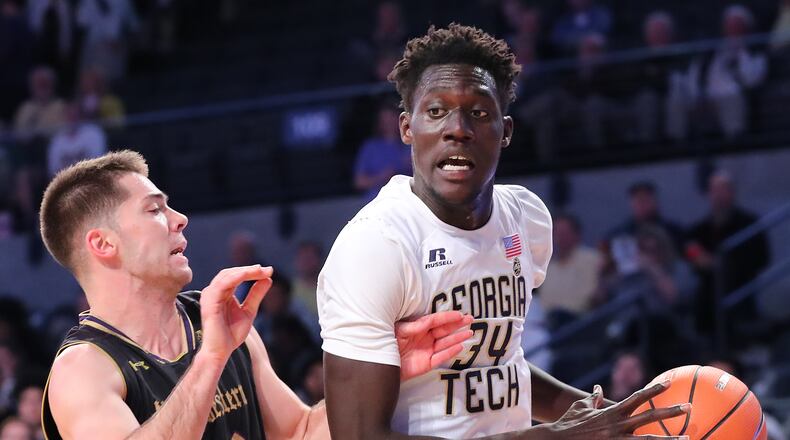 November 28, 2017 Atlanta: Georgia Tech forward Abdoulaye Gueye works to the basket against Northwestern guard Bryant McIntosh in a NCAA college basketball game on Tuesday, November 28, 2017, in Atlanta.   Curtis Compton/ccompton@ajc.com