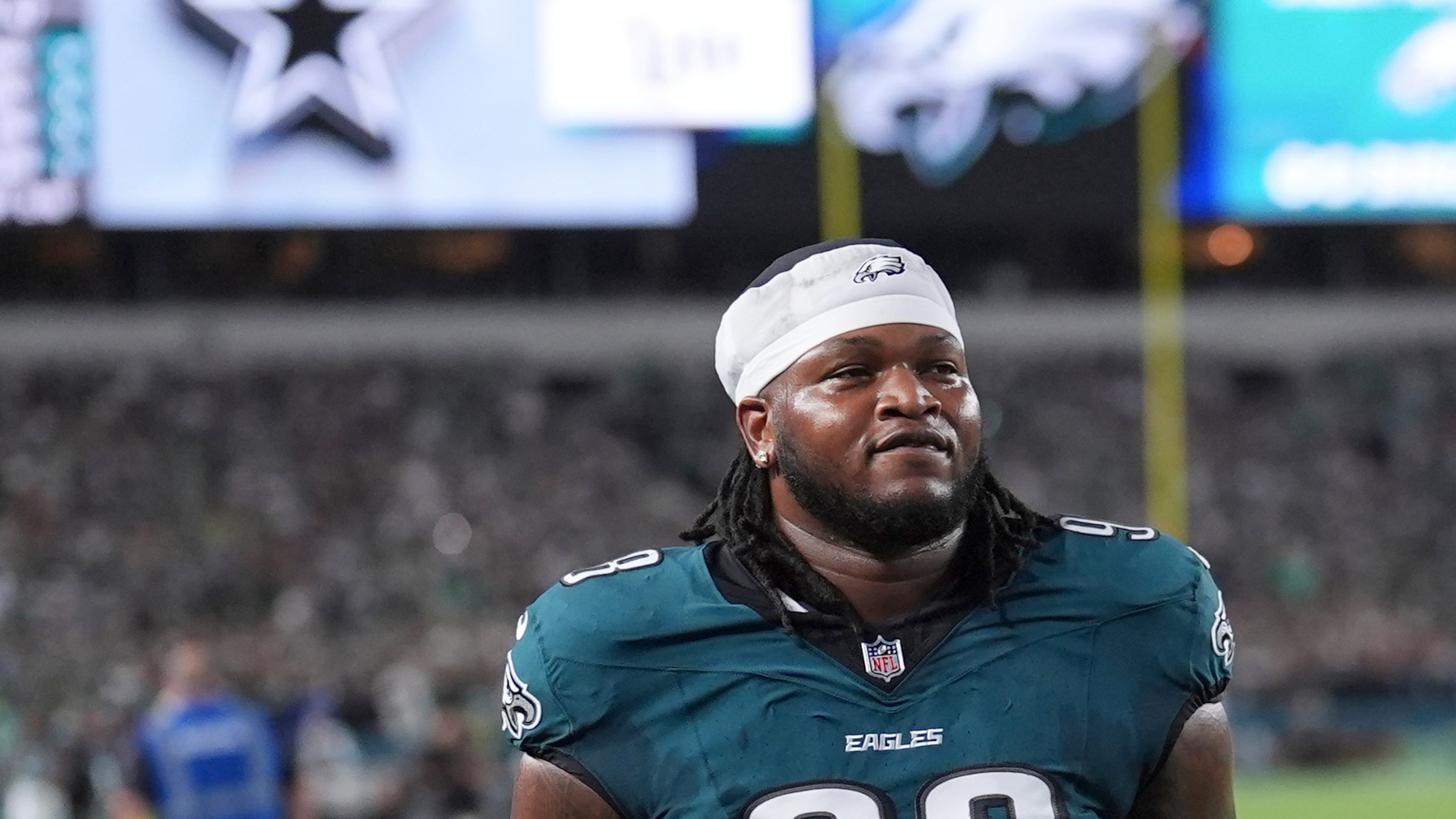 FILE - Philadelphia Eagles' Jalen Carter walks off the field after being ejected from an NFL football game against the Dallas Cowboys, Thursday, Sept. 4, 2025, in Philadelphia. (AP Photo/Matt Slocum, File)