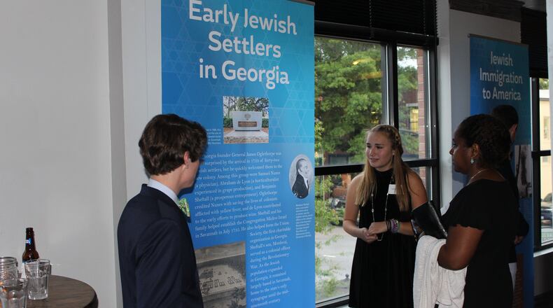 Students from Pope High School’s Globalization Academy work on a number of scholarly projects, including a researched study on the Jewish immigrant experience in Georgia.