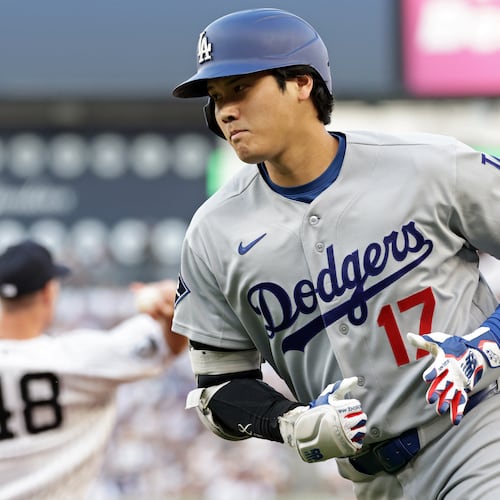 Los Angeles Dodgers designated hitter Shohei Ohtani (17) reacts after grounding out during the first inning of a baseball game against the New York Yankees, Friday, July 17, 2026, in New York. (AP Photo/Adam Hunger)