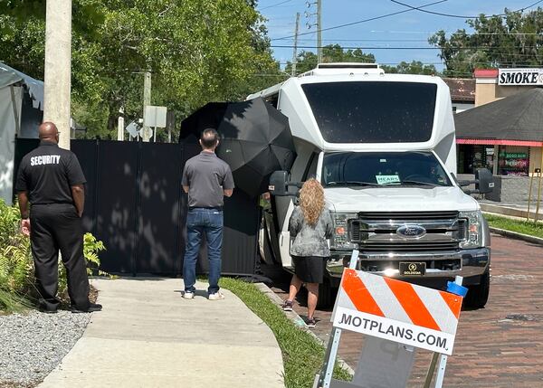 The first bus carrying survivors and family members of those who died arrive for at walk through for the first time at the Pulse nightclub in Orlando, Florida on Wednesday June 11, 2025. (AP Photo/Mike Schneider)