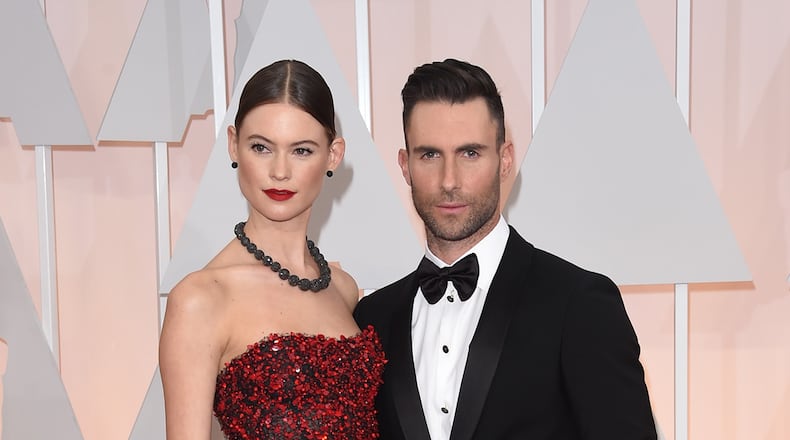 Singer Adam Levine (L) and model Behati Prinsloo are expecting a second daughter. Prinsloo is seven months pregnant.
