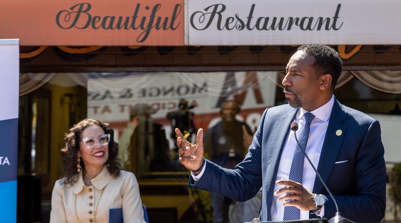Mayor Andre Dickens announced $8.2 million in grant awards to Atlanta small businesses and nonprofits. as Dr. Eloisa Klementich, President and CEO of Invest Atlanta, looks on at the Beautiful Restaurant in Atlanta Tuesday, August 30, 2022. Steve Schaefer/steve.schaefer@ajc.com)