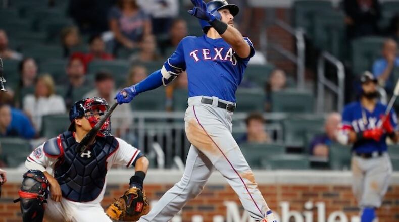 Texas Rangers Joey Gallo flies out for the final out in the ninth inning of the second game of a baseball doubleheader against the Atlanta Braves, Wednesday, Sept. 6, 2017, in Atlanta. The Braves won the game 5-4. (AP Photo/Todd Kirkland)