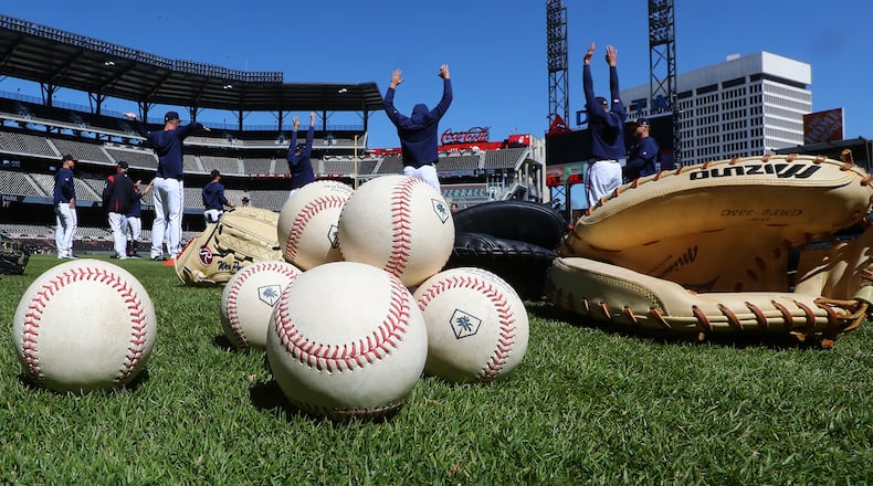 Braves pitchers loosen up for batting practice before before he 2019 home opener at SunTrust Park (now Truist Park).
