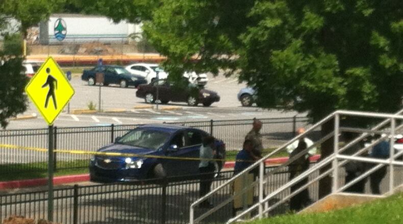 According to Cobb County Sheriff’s Office and a witness report, a woman driving a blue Chevrolet was leaving the sheriff’s office when her car hit the deputies alongside County Services Parkway.