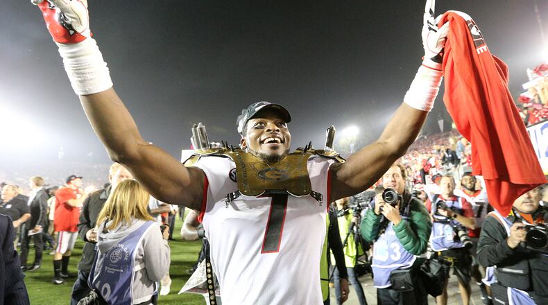Georgia linebacker Lorenzo Carter celebrates beating Oklahoma in the College Football Playoff semifinal in the Rose Bowl on Monday.