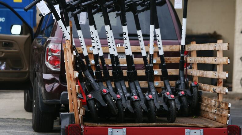 As businesses reopen and traffic builds ahead of the Fourth of July weekend, two e-scooter companies have announced their return to Atlanta’s streets. CHRISTINA MATACOTTA / Christina.Matacotta@ajc.com