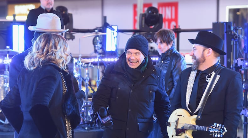 NEW YORK, NY - DECEMBER 31: Ryan Seacrest speaks onstage with Sugarland at the Dick Clark's New Year's Rockin' Eve with Ryan Seacrest 2018 on December 31, 2017 in New York City. (Photo by Nicholas Hunt/Getty Images for dick clark productions)
