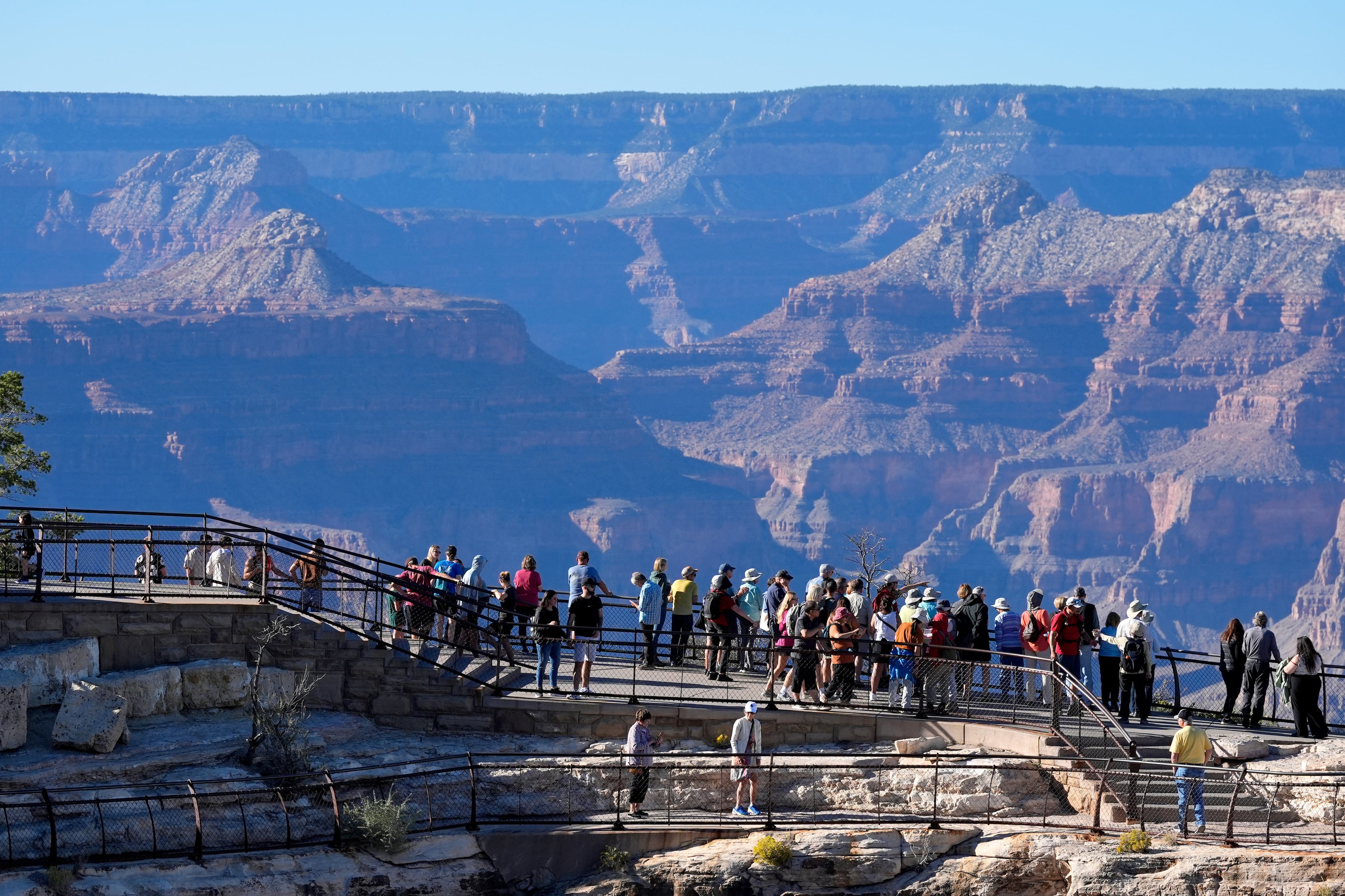 Tourists enjoyed the view at Grand Canyon National Park in Arizona in October. (Ross D. Franklin/AP)