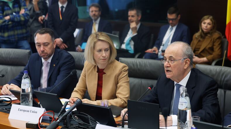 European Union foreign policy chief Kaja Kallas, center, listens as Palestinian Prime Minister Mohammad Mustafa, right, speaks during a meeting of the Global Alliance for the Implementation of the Two-State Solution in Brussels, Monday, April 20, 2026. (AP Photo/Geert Vanden Wijngaert)
