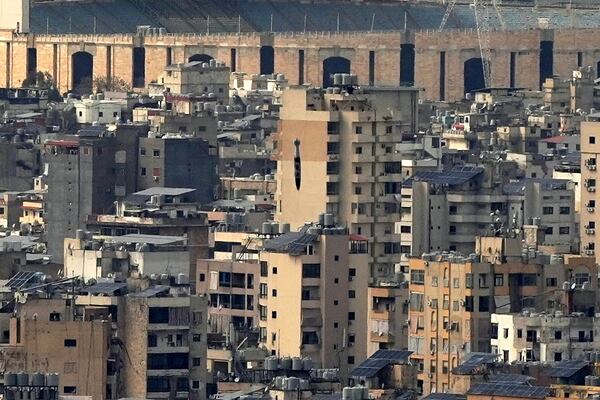 A bomb dropped from an Israeli jet falls before hitting a building in Dahiyeh, in the southern suburb of Beirut, Lebanon, Friday, March 28, 2025. (AP Photo/Hassan Ammar)