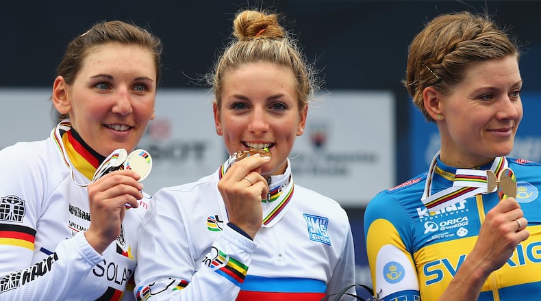 PONFERRADA, SPAIN - SEPTEMBER 27: (l to r) Lisa Brennauer (2nd) of Germany, Pauline Ferrand-Prevot (1st) of France and Emma Johansson (3rd) of Sweden stand on the podium after the Women's Elite Road Race on day six of the UCI Road World Championships on September 27, 2014 in Ponferrada, Spain. (Photo by Bryn Lennon/Getty Images)