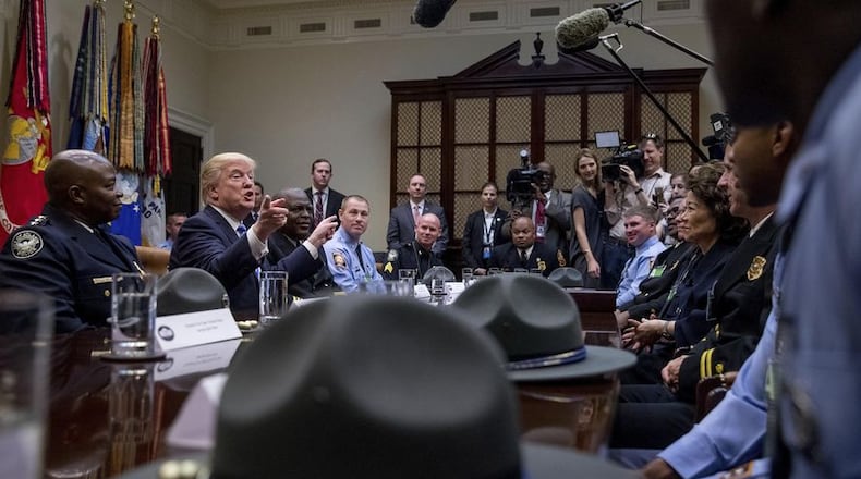 Brian Jack is standing to President Donald Trump's right at a recent meeting with Georgia first-responders. AP file.