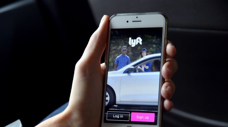 SAN FRANCISCO, CA - FEBRUARY 03:  The Lyft app is seen on a passenger's phone on February 3, 2016 in San Francisco, California.  (Photo by Mike Coppola/Getty Images for Lyft)