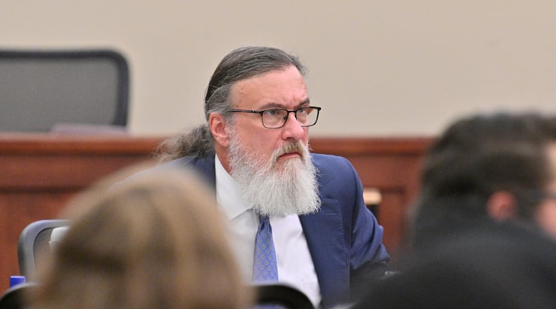 January 31, 2022 Americus - Attorney William McCall Calhoun sits next to his client Deontrey Parker (not pictured) during jury selection for alleged drug-related murder trial before Superior Court Judge Jimmie Brown (not pictured) at Sumter County Courthouse in Americus on Monday, January 31, 2022. Americus attorney William McCall Calhoun is out on bond and facing felony charges related to his activities at the U.S. Capitol on Jan. 6, 2021. While on bond, he is subject to home confinement and GPS monitoring (ankle monitor). (Hyosub Shin / Hyosub.Shin@ajc.com)