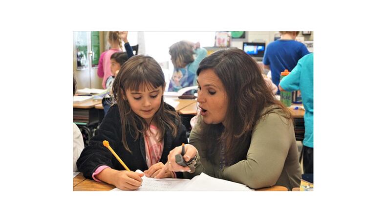A Cherokee County elementary school student works on a writing exercise. The district reported it has again exceeded the state’s average College and Career Ready Performance Index accountability scores. CHEROKEE COUNTY SCHOOLS