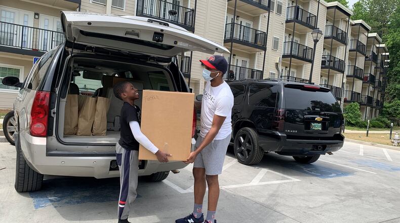 A Create Your Dreams volunteer delivers meals early this week compliments of the MARCH Foundation. CONTRIBUTED