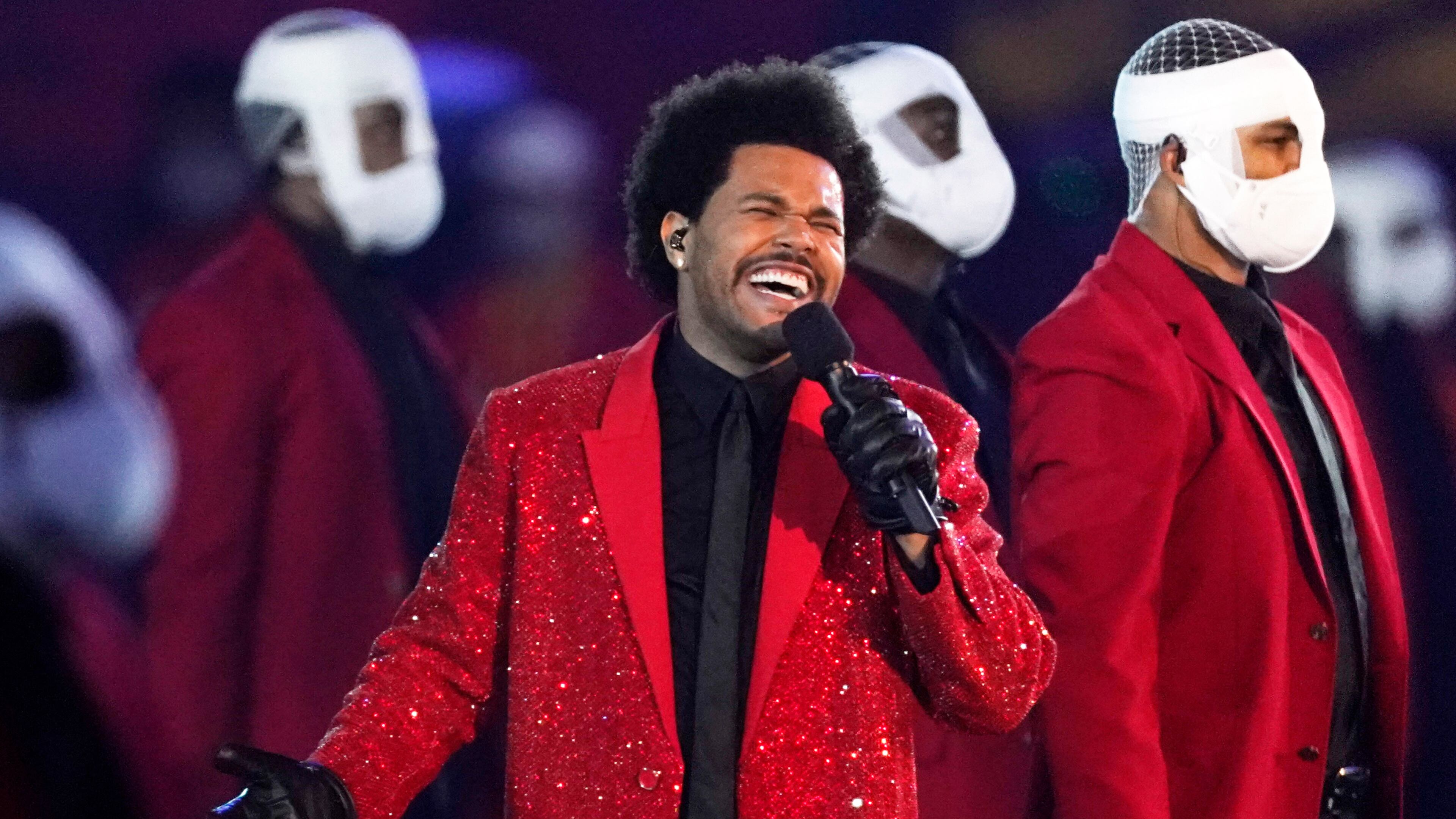 FILE - The Weeknd performs during the halftime show of the NFL Super Bowl 55 football game between the Kansas City Chiefs and Tampa Bay Buccaneers, on Feb. 7, 2021, in Tampa, Fla. (AP Photo/Ashley Landis, File)