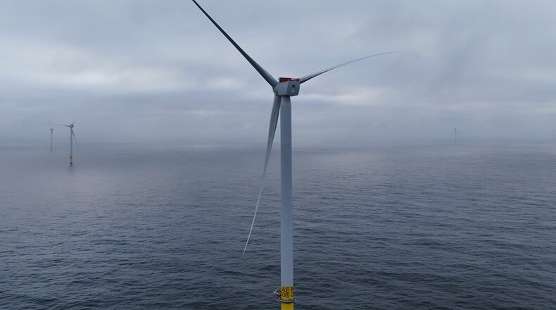 Turbines are visible at Revolution Wind offshore wind farm that is under construction off the coast of Rhode Island, Thursday, April 23, 2026. (AP Photo/Joshua A. Bickel)